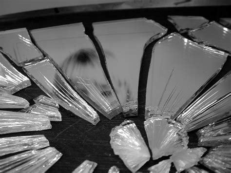BROKEN MIRRORS .